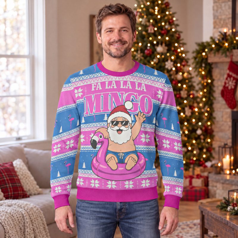 Man wearing the Fa La La La Mingo flamingo ugly Christmas sweater sweatshirt in a living room decorated for Christmas