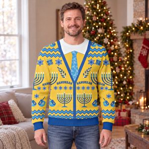 Man wearing the Hanukkah cardigan sweater, a yellow sweatshirt with a printed blue cardigan, white collar and menorah tie